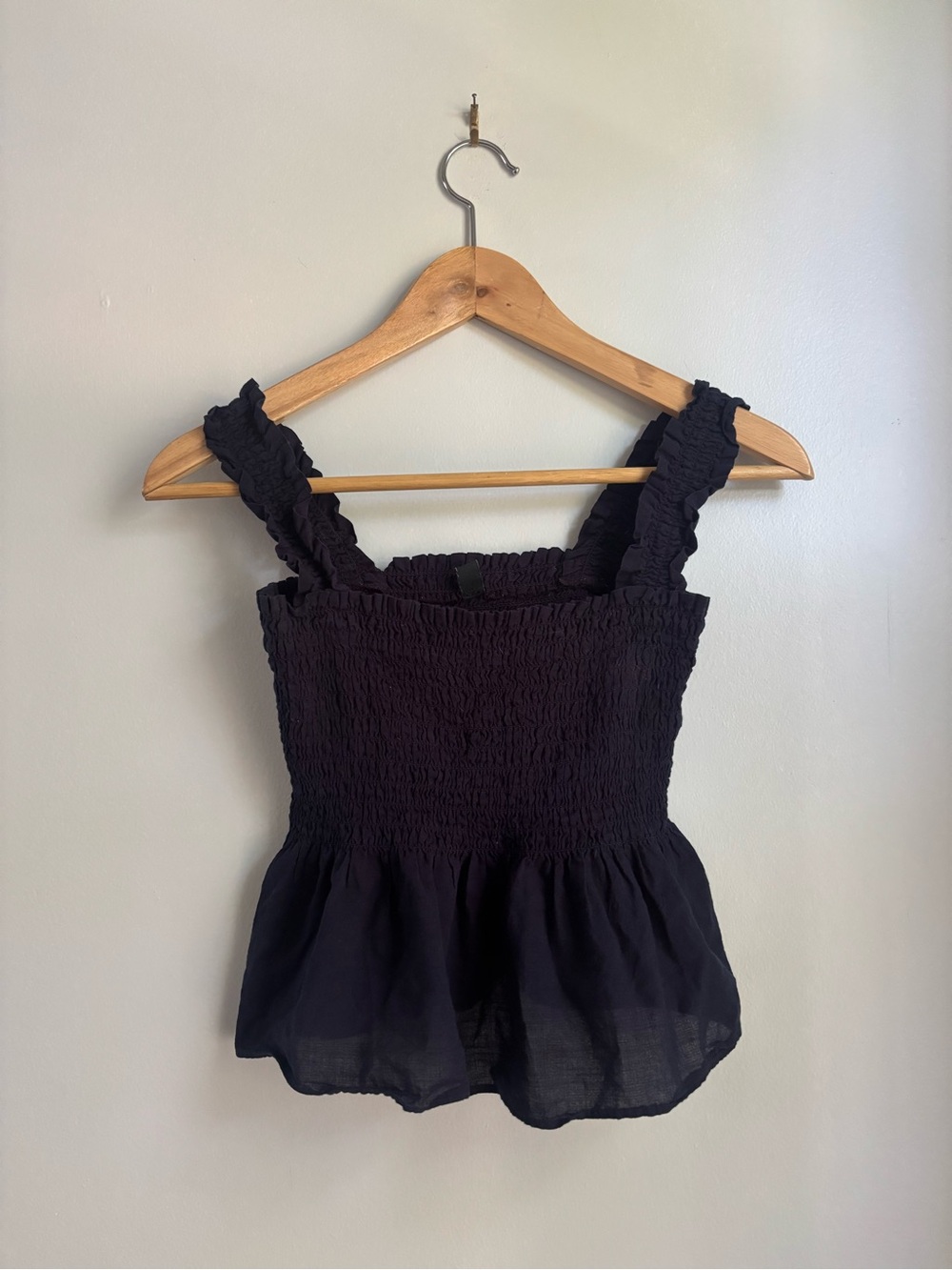 Smocked peplum top